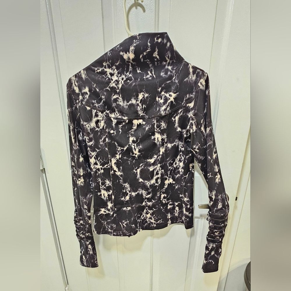 Karma “San Suu” Asymmetrical Ruffle Mock Neck Athletic Jacket | Marble Print - Picture 3 of 4
